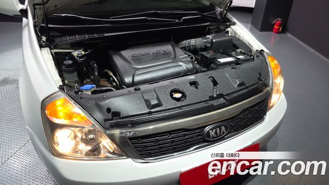 Kia Canival 2013 — photo 6