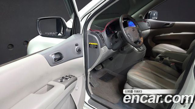 Kia Canival 2013 — photo 10