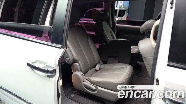 Kia Canival 2013 — photo 11