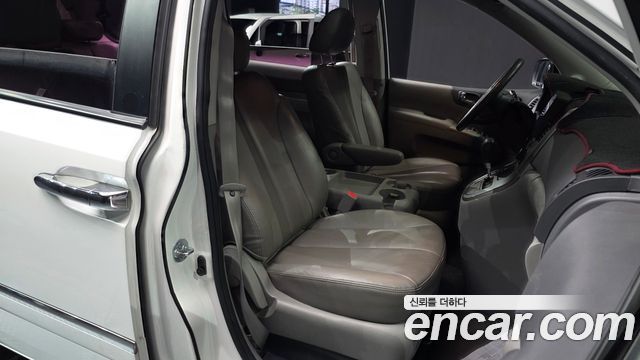 Kia Canival 2013 — photo 12