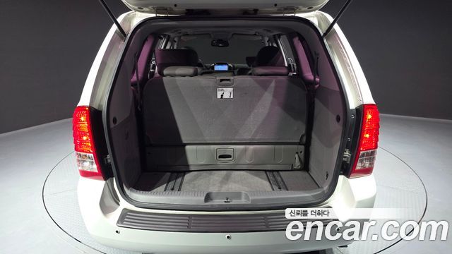 Kia Canival 2013 — photo 18