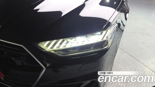 Audi A7 2023 — photo 8