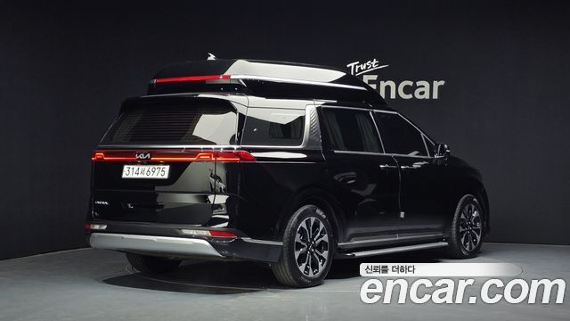 Kia Canival 2023 — photo 2