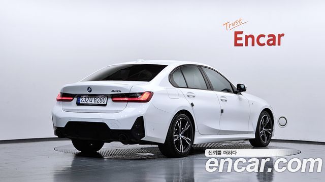BMW 3-Series 2024 — photo 2