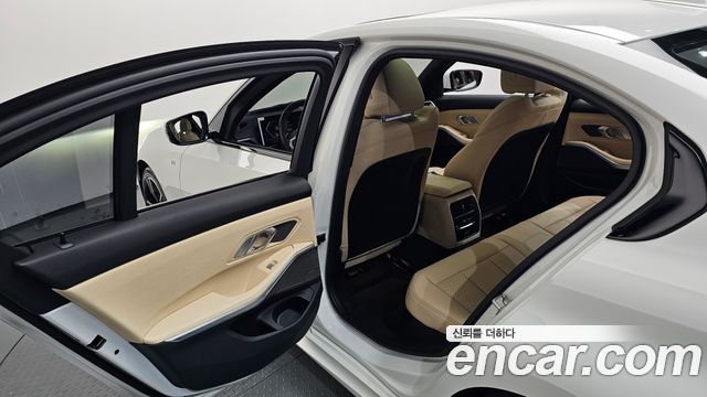BMW 3-Series 2024 — photo 28