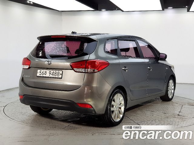 Kia Carens 2014 — photo 4