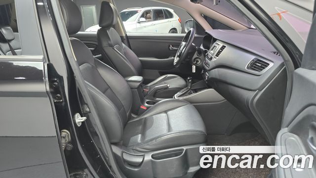 Kia Carens 2014 — photo 16