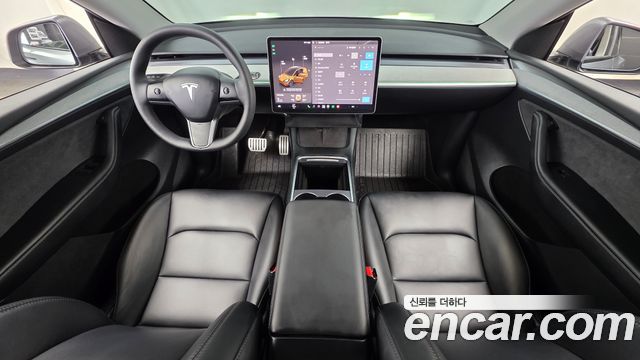 Tesla Model Y 2024 — photo 7