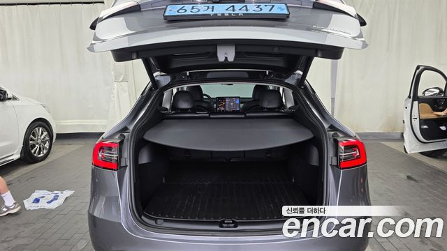 Tesla Model Y 2024 — photo 20