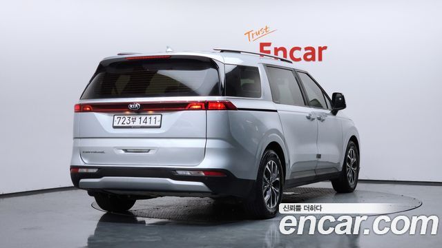 Kia Canival 2021 — photo 2
