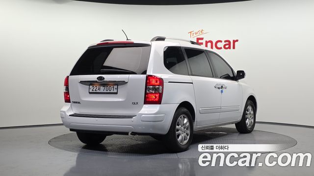 Kia Canival 2012 — photo 2