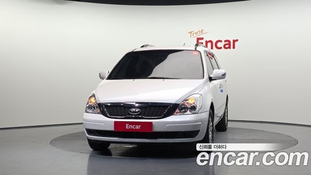 Kia Canival 2012 — photo 3