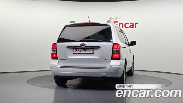 Kia Canival 2012 — photo 4