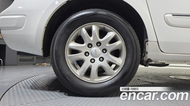 Kia Canival 2012 — photo 5