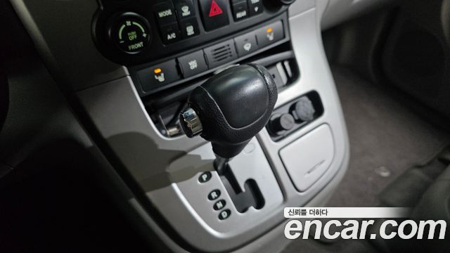 Kia Canival 2012 — photo 12