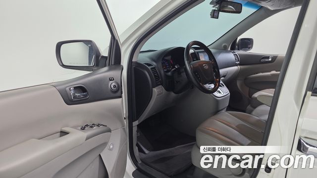 Kia Canival 2012 — photo 13