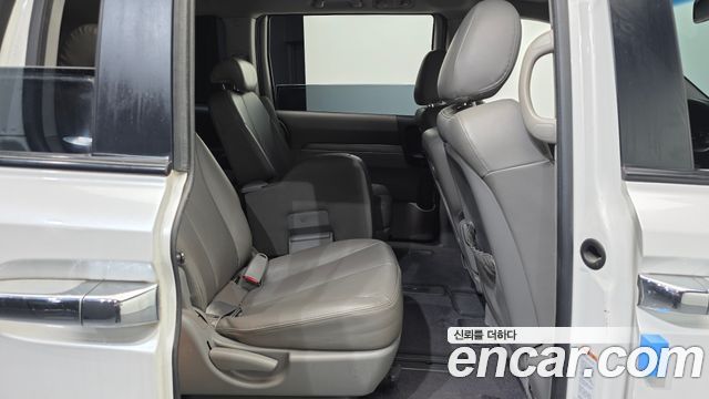 Kia Canival 2012 — photo 17