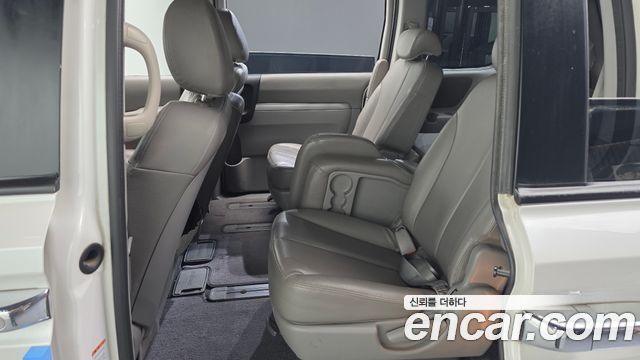 Kia Canival 2012 — photo 18