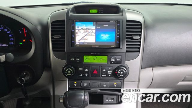 Kia Canival 2012 — photo 20