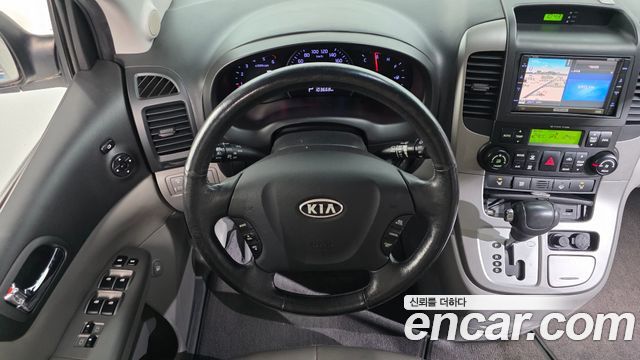 Kia Canival 2012 — photo 21