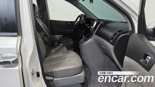 Kia Canival 2012 — photo 16