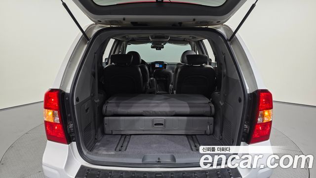 Kia Canival 2012 — photo 27