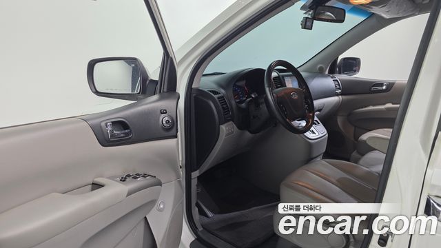 Kia Canival 2012 — photo 28