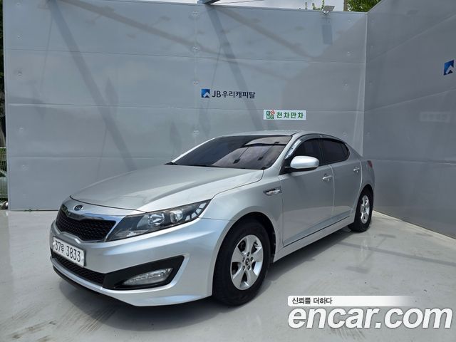 Kia K5 2011 — photo 1