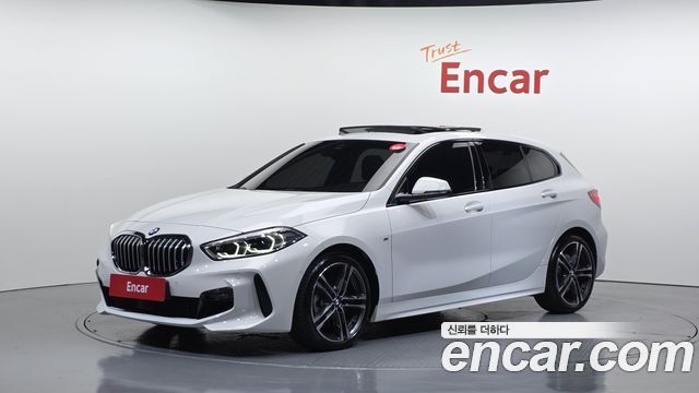 BMW 1-Series 2023 — photo 1