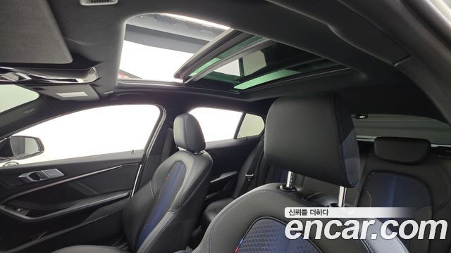 BMW 1-Series 2023 — photo 24