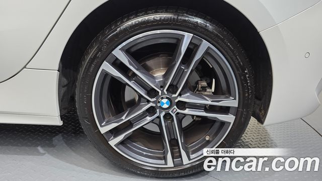 BMW 1-Series 2023 — photo 7