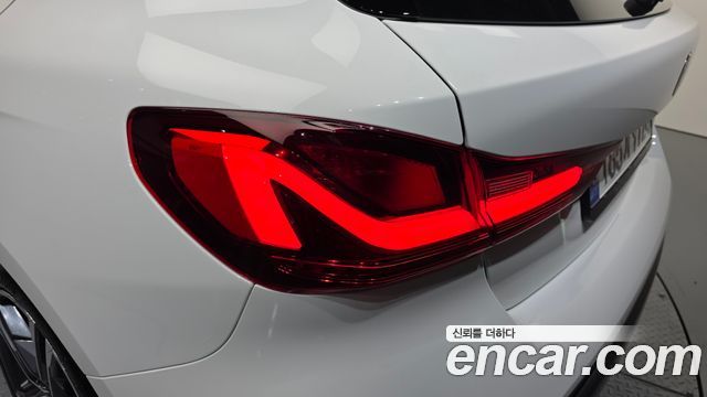 BMW 1-Series 2023 — photo 9