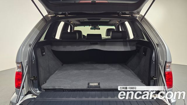 BMW X5 2006 — photo 20