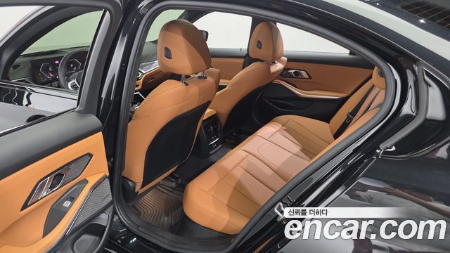 BMW 3-Series 2024 — photo 16
