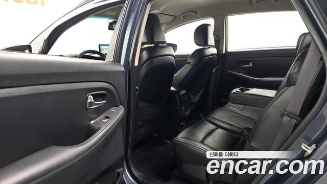 Kia Carens 2014 — photo 11
