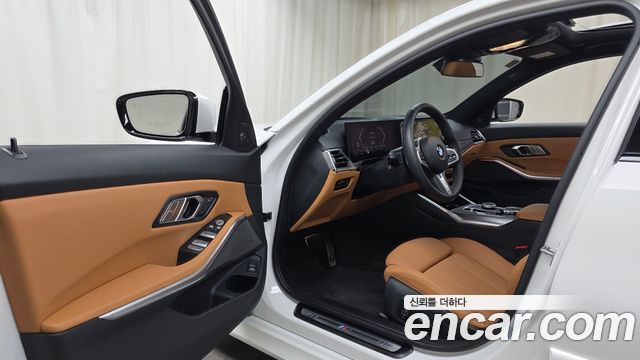 BMW 3-Series 2024 — photo 13
