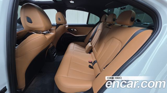BMW 3-Series 2024 — photo 16