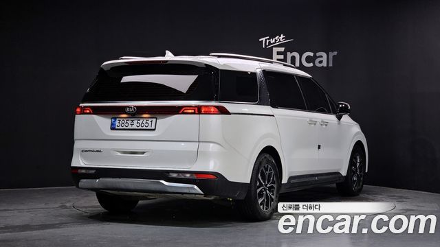 Kia Canival 2021 — photo 2