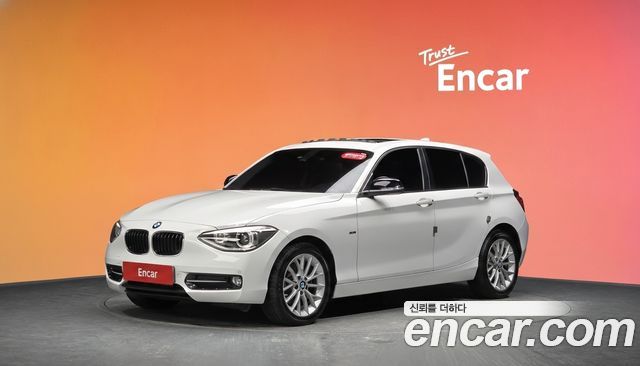 BMW 1-Series 2015 — photo 1