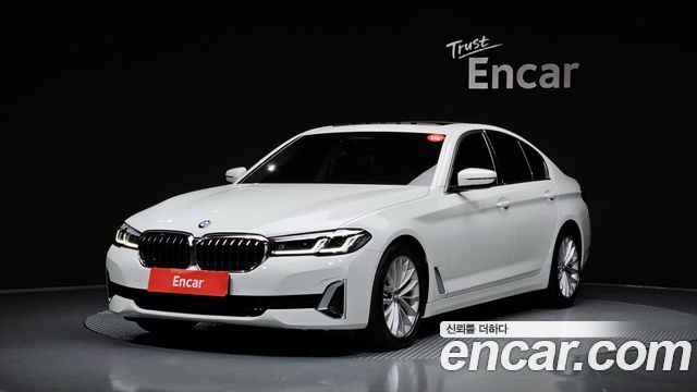 BMW 5-Series 2022 — photo 1
