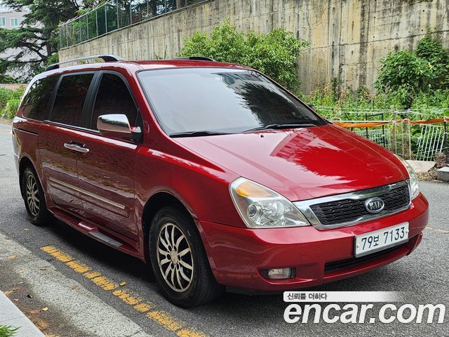 Kia Canival 2010 — photo 3