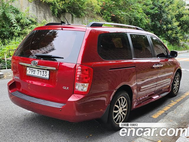 Kia Canival 2010 — photo 4