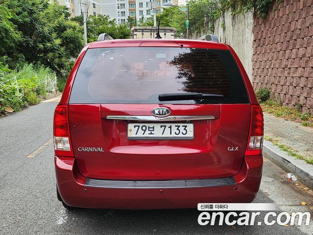 Kia Canival 2010 — photo 5