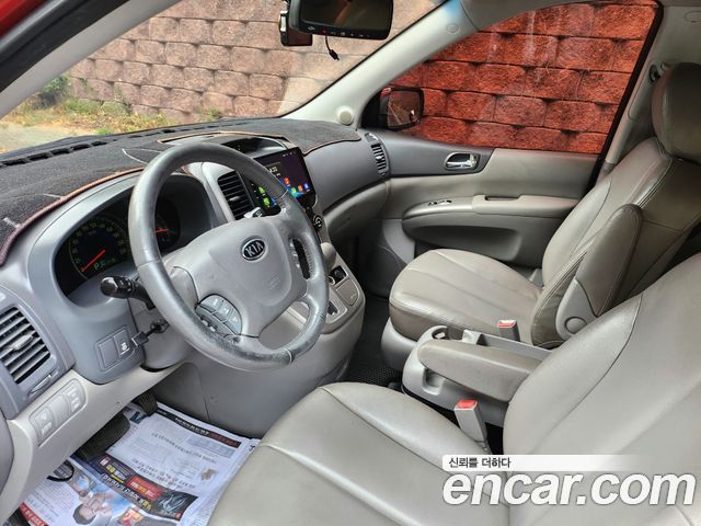 Kia Canival 2010 — photo 10