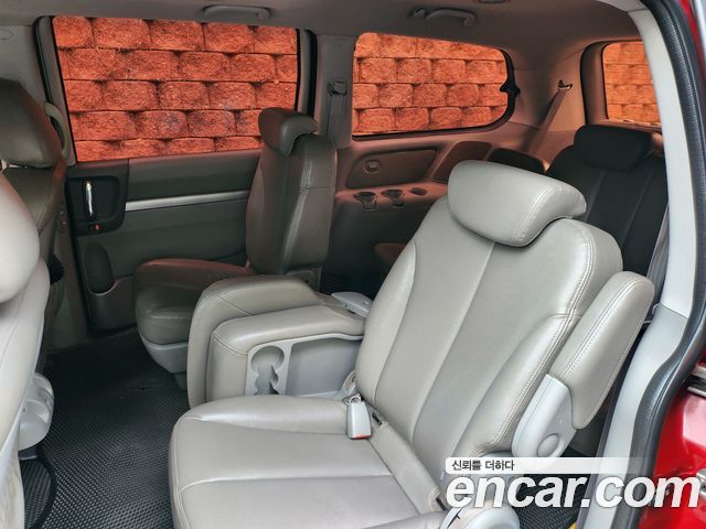 Kia Canival 2010 — photo 11