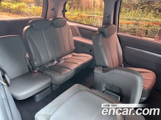 Kia Canival 2010 — photo 12