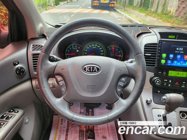 Kia Canival 2010 — photo 14