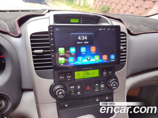 Kia Canival 2010 — photo 15