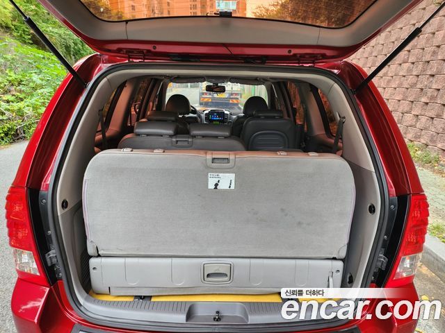 Kia Canival 2010 — photo 20
