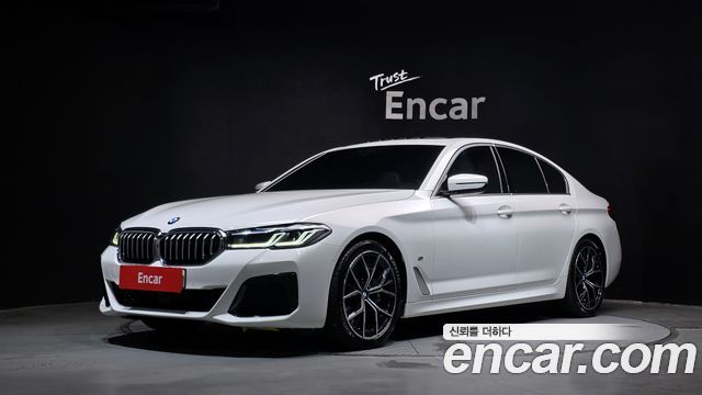 BMW 5-Series 2023 — photo 1